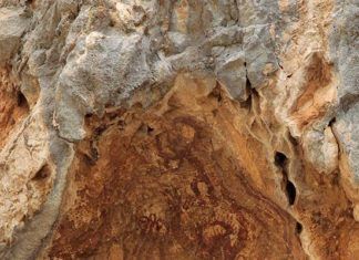 "Orante, figura humana y motivos geométricos". Abrigo V de Pla de Petracos.