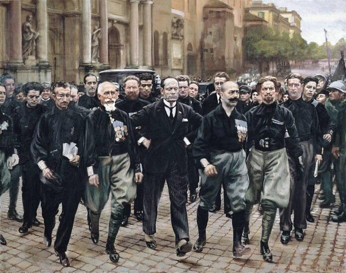 La marcha sobre Roma de 1922, recreada por el pintor futurista Giacomo Balla. En el centro, Mussolini, rodeado por los principales dirigentes fascistas.