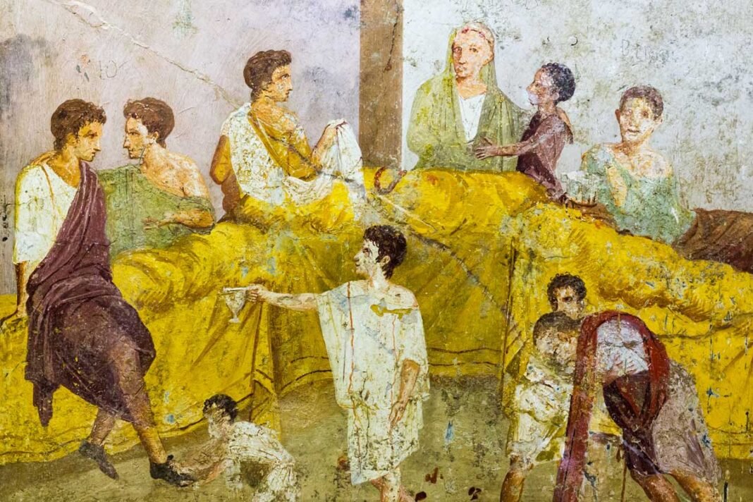 Fresco pompeyano que reconstruye un banquete realizado en época romana.