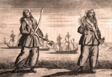 Anne Bonny y Mary Read, en un grabado que ilustra la edición de una "Historia de los piratas", de 1724.