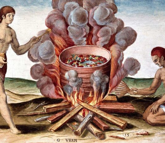 Indios cocinando pescado. Grabado de 'Admirante Narratio Americae' por Theodore de Bry (1528-1598).