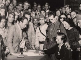 Amar en tiempos de guerra Celebración de un matrimonio civil entre milicianos en territorio republicano.